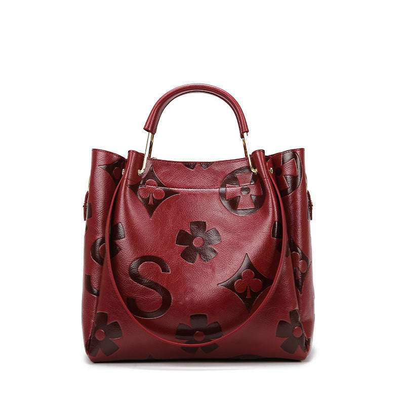 Lucia | Bolso Bucket Vintage Texturizado con Neceser Extraíble