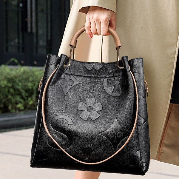 Lucia | Bolso Bucket Vintage Texturizado con Neceser Extraíble