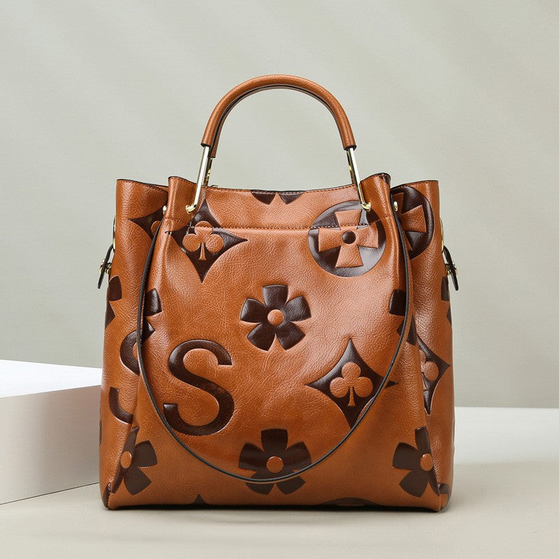 Lucia | Bolso Bucket Vintage Texturizado con Neceser Extraíble